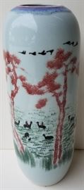 Tall Signed Chinese Scenic Flambe Vase

Porcelain, landscape with riders and farm animals beyond trees beneath flying geese, poetry, inscription and or signature in black with red seal on side panel, incised underglaze three character script signature on base, blue flambe ring inward to oxblood sang de boeuf around rim, Republic era.

15.5 inches high x 5.5 inches widest diameter.