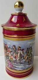 Le Tallec Porcelain Napoleon Apothecary Jar

Napoleonic Paris or Limoges tradition Continental European art pottery military or regimental motif scenic claret ground hp hand painted and gilt vintage one foot high covered apothecary or lidded storage jar designed by Atelier Le Tallec. Date indication of 1959. Note: La Tallec has designed for Tiffany & Co. et al.

Hallmarks, etc.: Dessine et peint entierement peint a la main par Le Tallec a Paris France, LT for Le Tallec, LL dtae mark for 1959 together with painter?s initials AG.

Approximately 12.125 inches high x 5.5 inches in diameter, height without lid is 8.5 inches.
