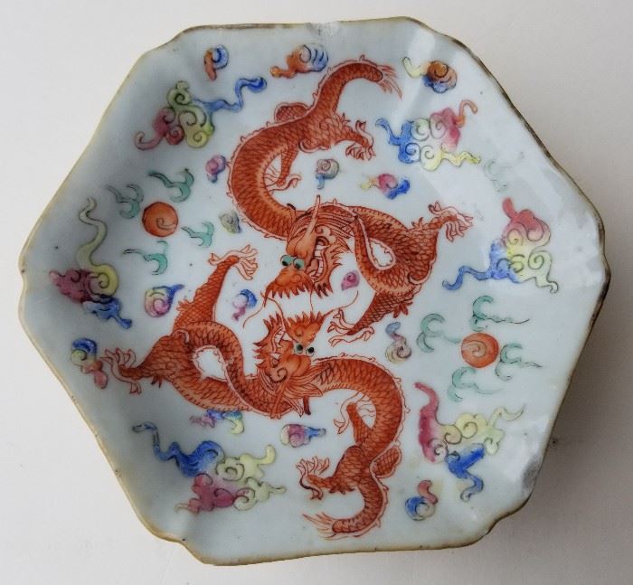 Signed Chinese Daoguang Enamel Plate

Signed with six character boxed Daoguang Qing mark, red export seal, modern paper label and inscised dot three character inscription.

Double dragon and clouds on top, birds and blossoms on sides, porcelain. Pedestal plate, dish, bowl or serving form.

5.5 inches across x 1.75 inches high.