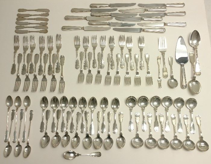 US State Dept Fiddle Thread 87pc Flatware Set

An 87 piece set of Fiddle Thread pattern Colonial Georgian Revival 20th century fiddle back motif sterling .925 silver flatware by the Frank W. Smith Silver Company of Gardner, Massachusetts that was according to the present owner ordered as a professional courtesy by the U.S. State Department and re-sold to him at cost.
Approx. 101.5ozt (approx. 95ozt solid sterling silver + 13 hollow handled pcs. at approx. 0.5ozt silver portion of weight ea.) variously in numbers of 6s, 12s and 16s plus five serving pieces and one additional badly damaged teaspoon. No monograms. Each solid piece with Smith lion rampant and S cojoined hallmark and marked STERLING, hollow handles marked STERLING, knife blades marked STEEL BLADE SILVER PLATED, pie server blade marked STAINLESS.

Provenance:

Private collection of a retired manager of a well known Dupont Circle, Washington, D.C. business whose clients included the National Gallery of Art and the State Dept.
