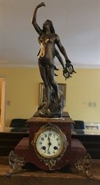 Nineteenth century French clock with matching candelabra