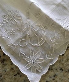 Several antique linen handkerchiefs.  Some monogrammed and some not.