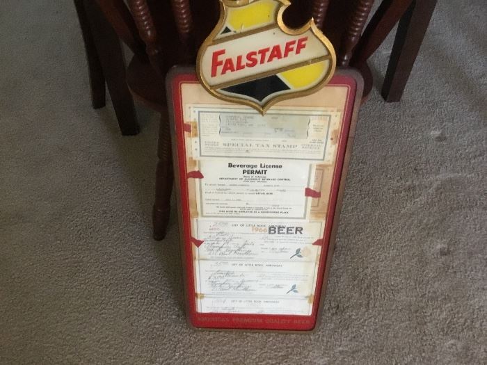 Vintage Falstaff signage - this one holds beer permits from 1960’s