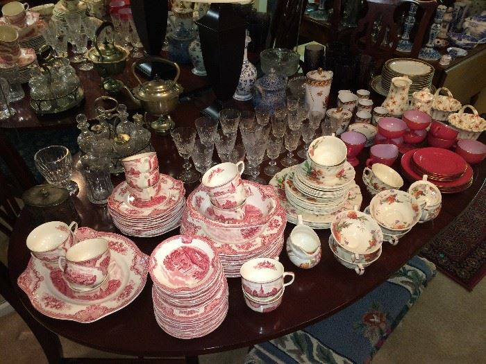 Johnson Bros. dinnerware; Antique castor set (background); many pieces of Edinburgh Scotland crystal glassware.