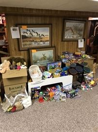 Misc toys, framed and signed Maynard Reece paintings. White train/activity table.