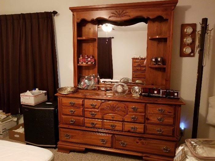 solid wood dresser with attached mirrored hutch