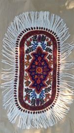 Completely hand embroidered table topper