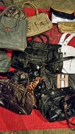 dozens of designer handbags, priced to sell