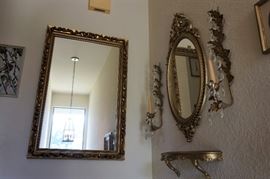 Hollywood Regency style mirrors and candle holders