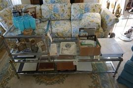 Long chrome and glass coffee table with matching end table on top