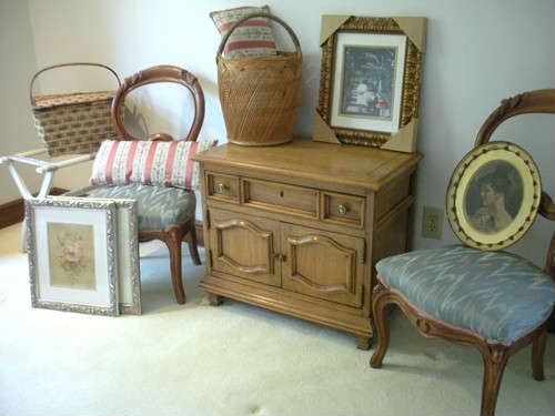 Antique and vintage furniture and furnishings throughout the home.