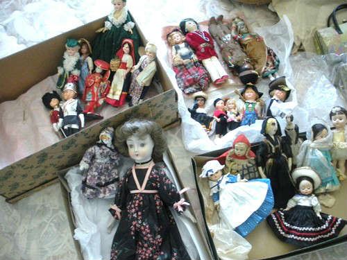 Vintage storybook and world dolls.