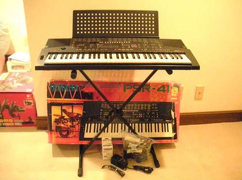 Yamaha PSR-41 electric keyboard, stand and accessories....perfect & working condition.