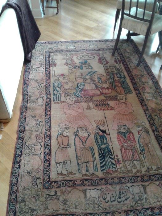 Such a coincidence...from the day we walked into the house, I called this rug my "Sad Shah on a Kerman", because I had never experienced an antique pictorial carpet quite like it...later I found an old appraisal identifying it as a "Tabriz".  But yesterday, my new rug guy tells me it is a "Kermanshah"!  I was right (sort of) from the beginning..at least that it was sad...there is old evidence of a small dog that that at some point appreciated this exquisite rug as well...and the price reflects.  