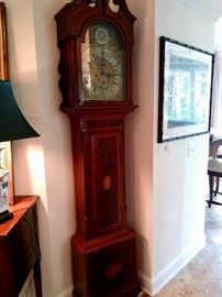 One of two antique tall clocks, this one has the original weights, but sadly, they are served "on the side"...but what it lacks in function, it doubles in form!