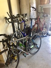 Three bicycles, plus garage rack and many cycling tools and accessories.