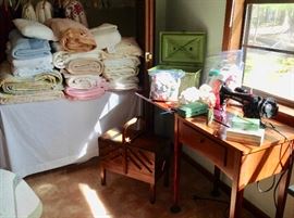 Vintage Singer Sewing Machine in a Cabinet, Nice Sewing Box, and some of the many Bed Linens