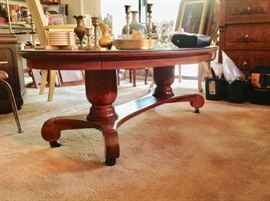 Rolling Oval Cocktail Table with Glass Top