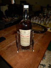 White Label Whiskey bottle with swing cradle