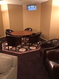 Hendredon Game table. Arhaus leather bucket chairs (6).