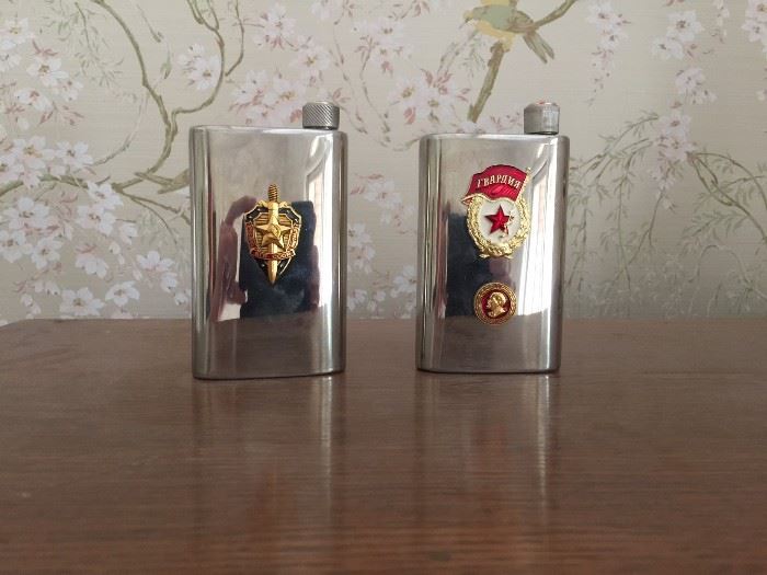 Steel flasks - from USSR (before wall fell) - one is KGB and other is Soviet army. Enamel on metal raised.