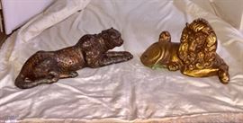 Leopard and lion ceramic statues