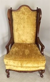 There are 2 of these parlor arm chairs. This one in gold and it's mate in silver.