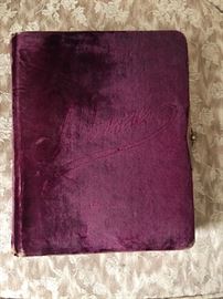 Antique photo album full of photos