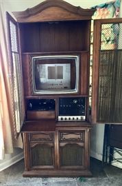 Vintage Magnavox entertainment cabinet. Missing TV, but has record player receiver
