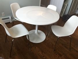34. Ikea White Tulip Table  (42"x 30")                                         35. 4 Ikea White side Chairs  (18"x 21"x 32")