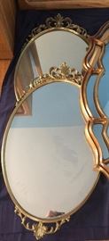 Pair of Oval Gilt Mirrors