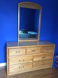 61. Stanley 7 Drawer Oak Dresser w/ Formica Top (54"x 18"x 30")  w/ Oak Framed Mirror  (29"x 45")