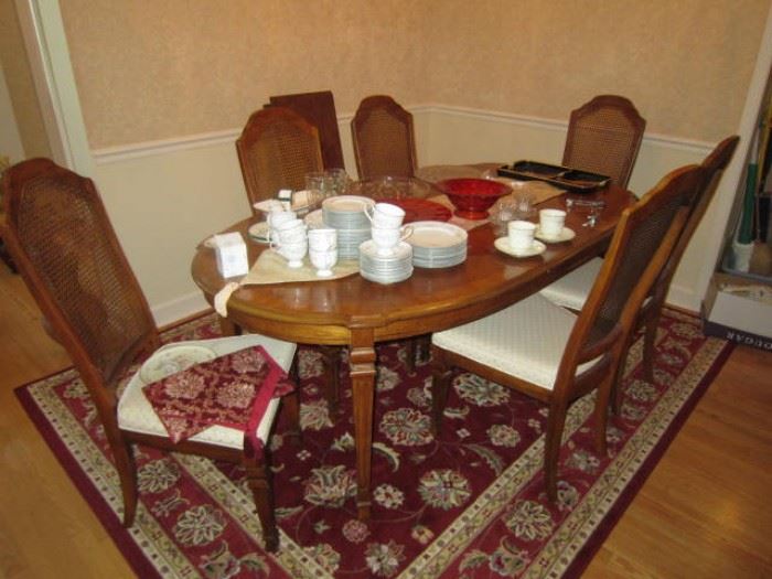 Dining table with 2 leaves and 6 chairs