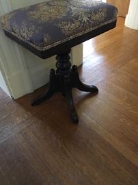 One of multiple piano stools