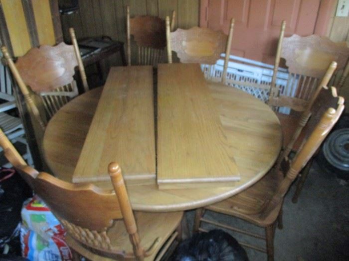 Wood Dinning table 6 press back chairs and 2 leaves
