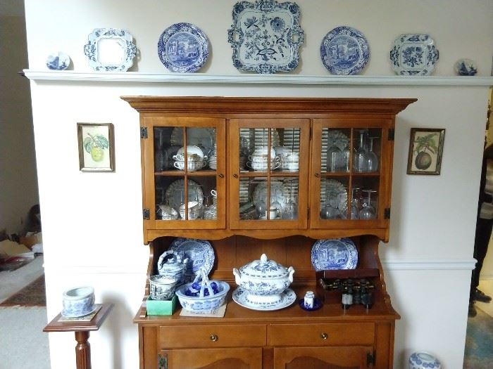 Vintage Ethan Allen cherry hutch, with collection of Blue Danube porcelain. 