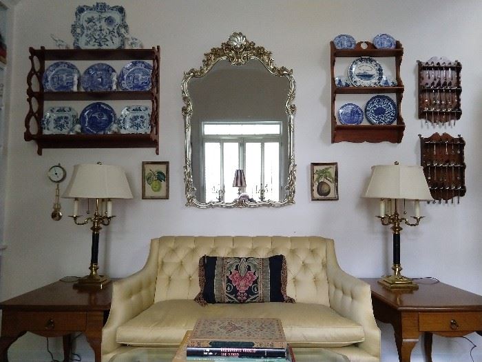 Pair of hand made wooden single drawer end tables, Kittinger love seat, with down cushion, pair of 3-arm French bouillotte lamps, silver gilt wood mirror, two sets of collectible silver spoon holders (mostly sterling), nice collection of Blue Danube porcelain.