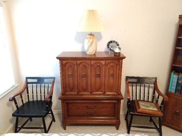 This is part of the "Dixie" 5-piece bedroom suite, flanked by a pair of collegiate wooden armchairs. 