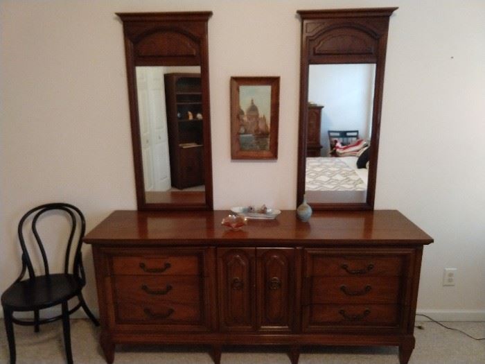 "Dixie" pecan wood dresser, with matching mirrors. 