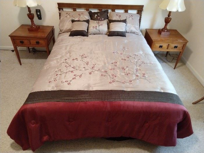 Queen size bed, with pair of handmade single drawer end tables and pair of wooden table lamps, made by the resident podiatrist. 