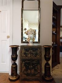 Hand painted Chinoiserie chest, with matching mirror, flanked by a pair of hand painted Theodore Alexander wooden urns,. 