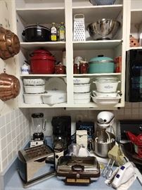 Blue Cornflower Corning Ware dishes, vintage cooper molds, vintage chrome appliances, KitchenAid mixer, etc.