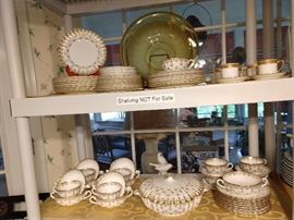 Another view of the 72-piece Spode "FLEUR DE LYS" gold china set.