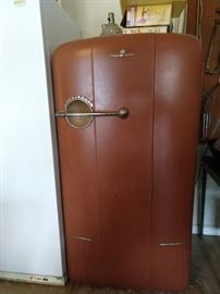 Here it is ladies and a few choice men! It's the vintage 1940's Kelvinator "Moist Master" refrigerator freezer to rock your world!                                                                                 Yes, after visions of Chippendale Trail dancers swimming in your head, this Moist Master will tame your wanton desires. Instead of taking a cold shower, just stick your head in this thing to cool off.