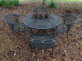 5-piece set of wrought iron outdoor patio furniture by Metalcrafters.