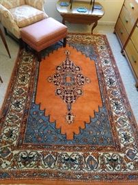 Persian design rug, hand woven, 100% wool face, measures 6' x 9'.