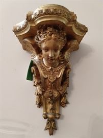 This is the real deal, gilt carved wood, not resin, made-in-China-yesterday schlock.