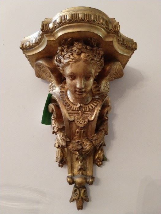 This is the real deal, gilt carved wood, not resin, made-in-China-yesterday schlock.