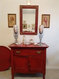 Ah! A 1970's "antiqued" chest! This is what bored housewives did in the 70's, when they weren't attending macrame classes.                                                                                And you thought chalk painting was a "thing" - those 70's chicks were WAY ahead of you! Love the pair of boudoir lamps, with groovy art glass shades.