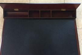 It even opens to store your supplies